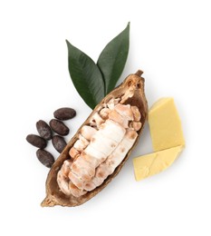 Cocoa pod with beans and butter isolated on white, top view