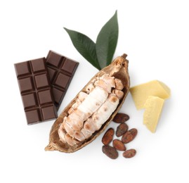 Photo of Cocoa pod with beans, butter and chocolate isolated on white, top view