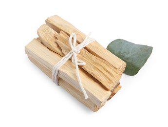 Photo of Palo santo sticks and eucalyptus leaf isolated on white