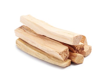 Photo of Pile of palo santo sticks isolated on white