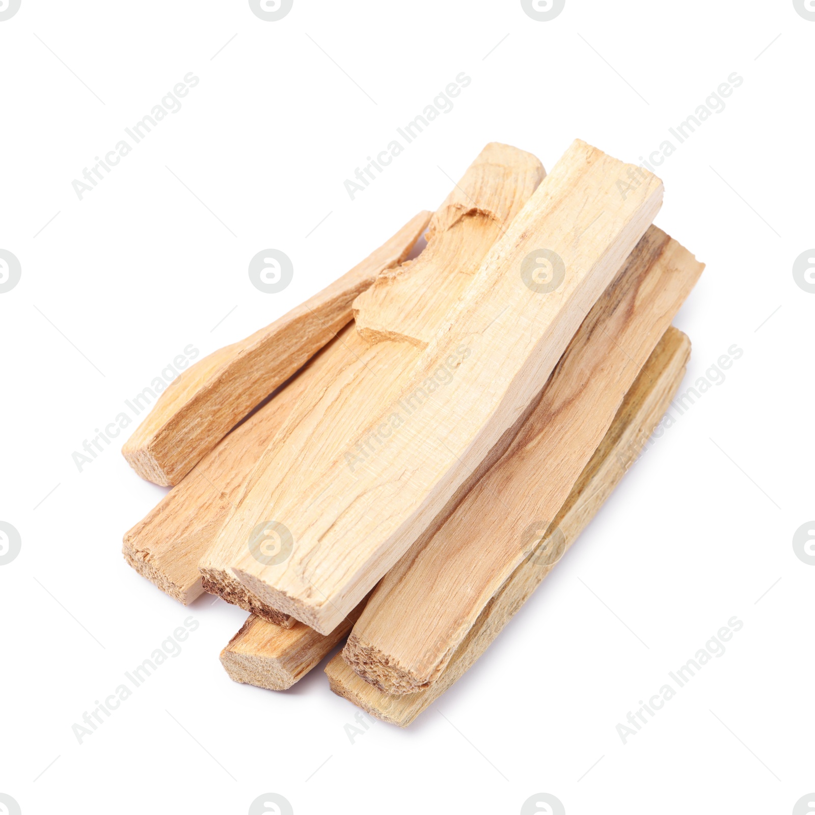 Photo of Pile of palo santo sticks isolated on white