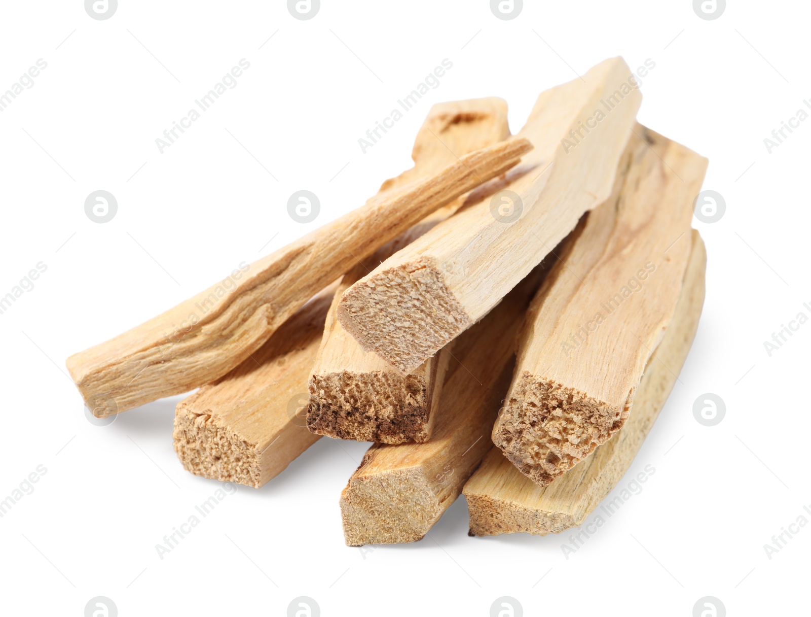 Photo of Pile of palo santo sticks isolated on white