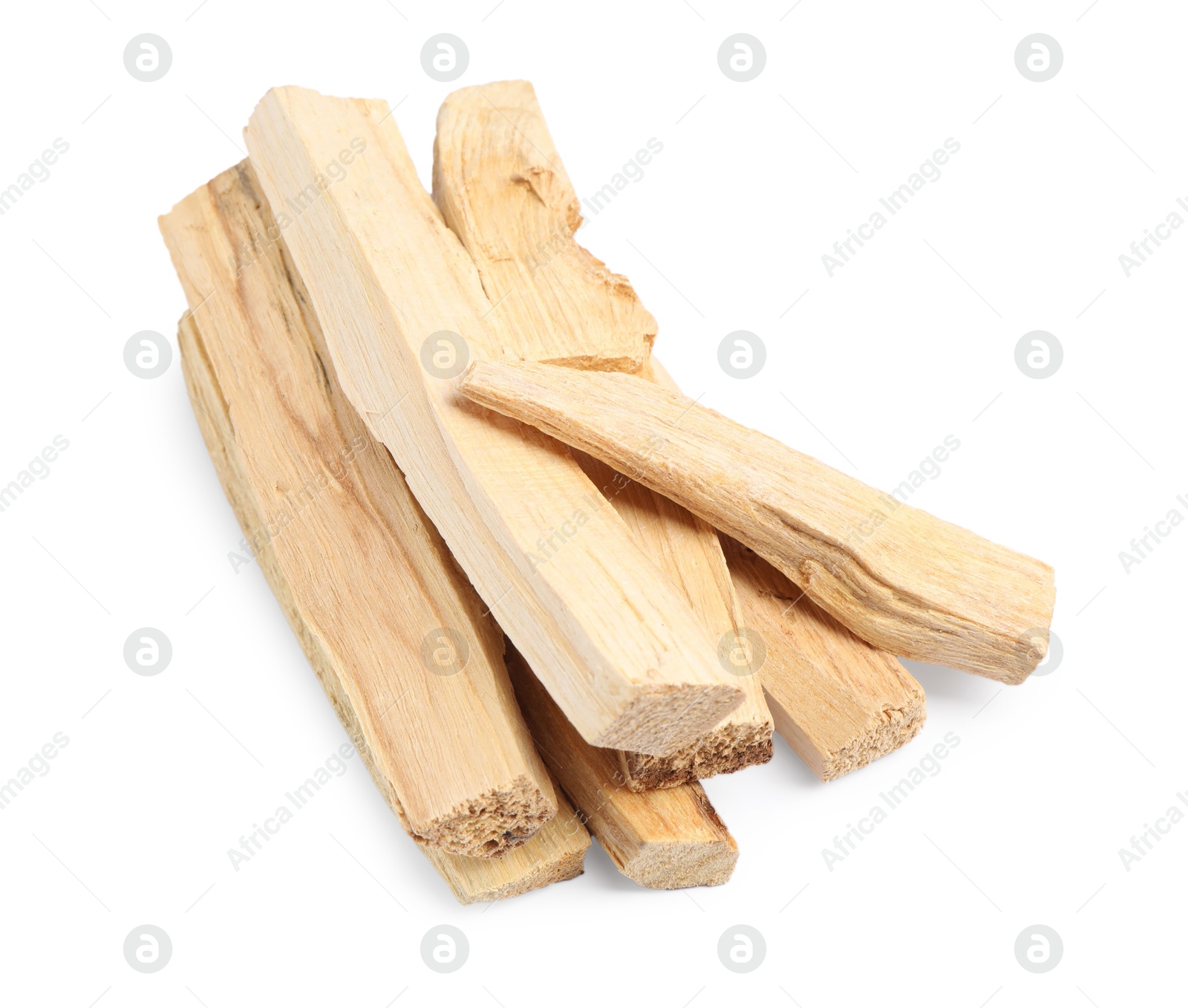 Photo of Pile of palo santo sticks isolated on white