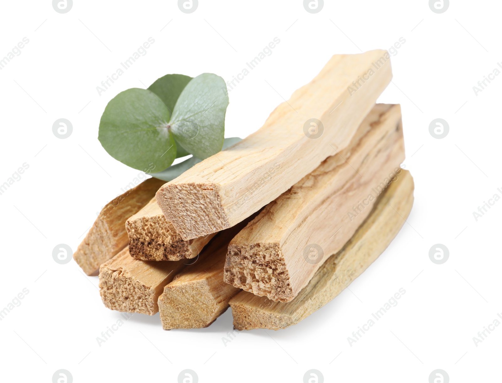 Photo of Palo santo sticks and eucalyptus leaves isolated on white