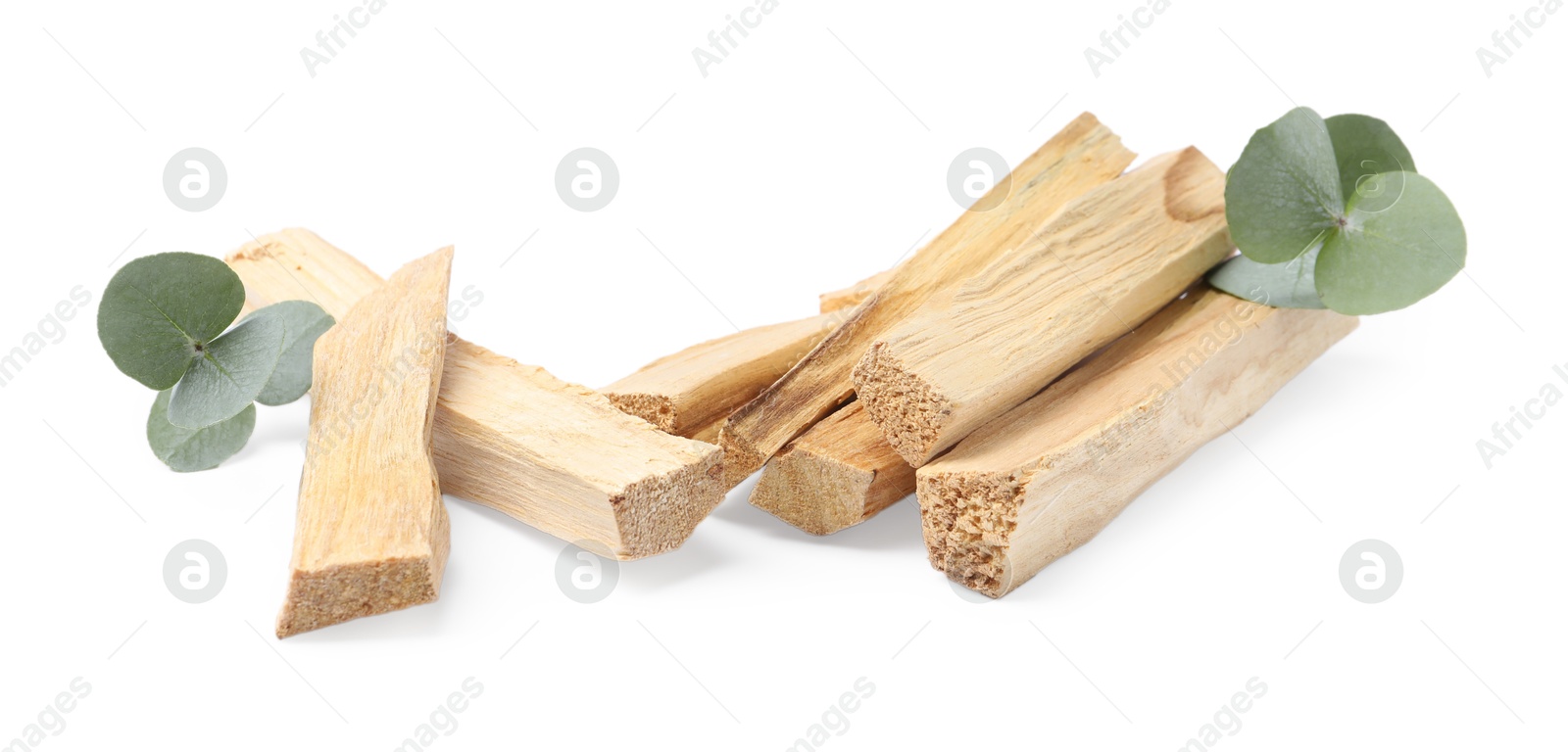 Photo of Palo santo sticks and eucalyptus leaves isolated on white