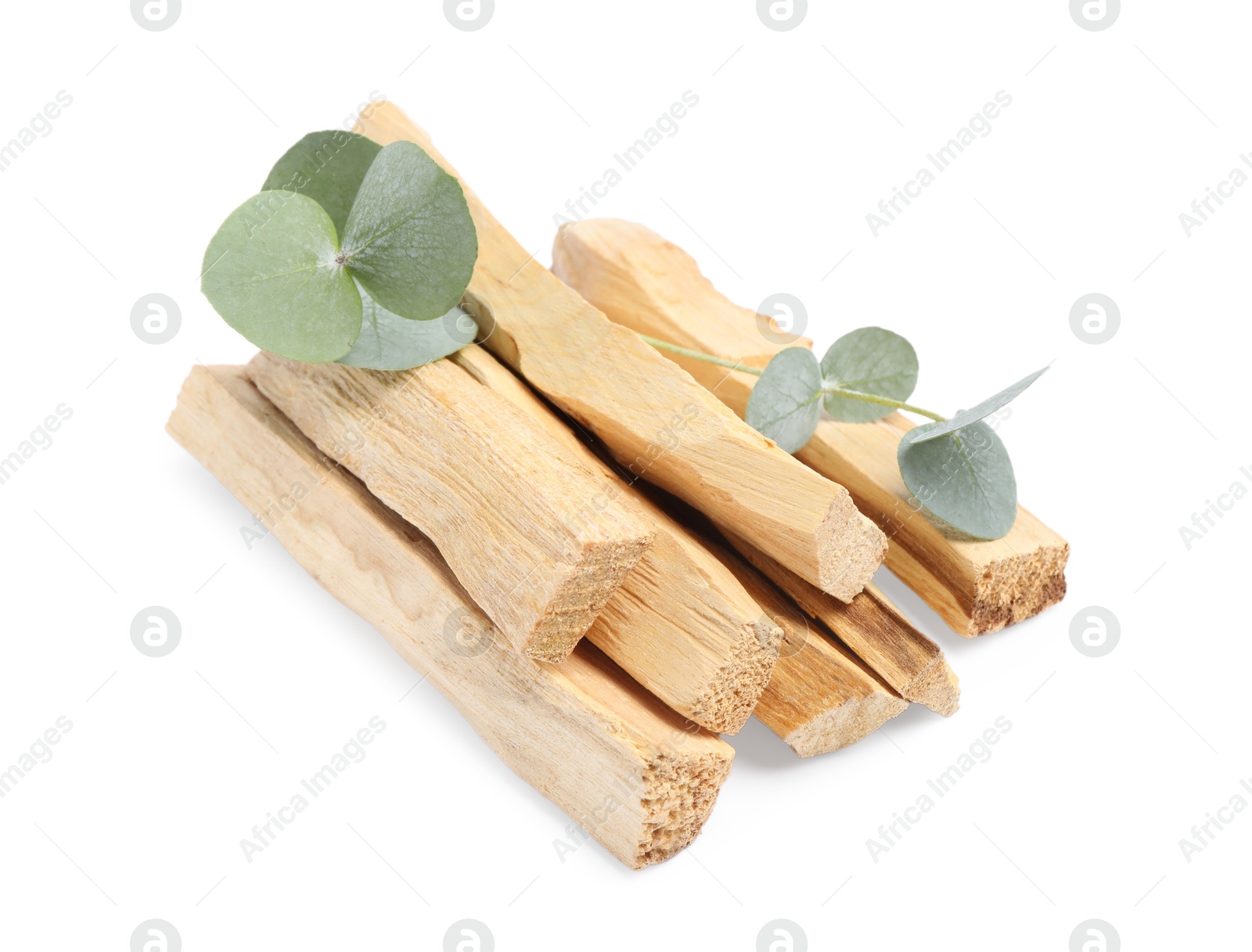 Photo of Palo santo sticks and eucalyptus branches isolated on white