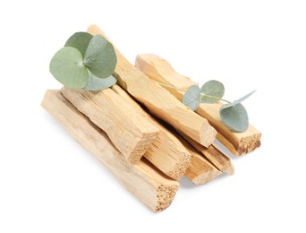 Photo of Palo santo sticks and eucalyptus branches isolated on white