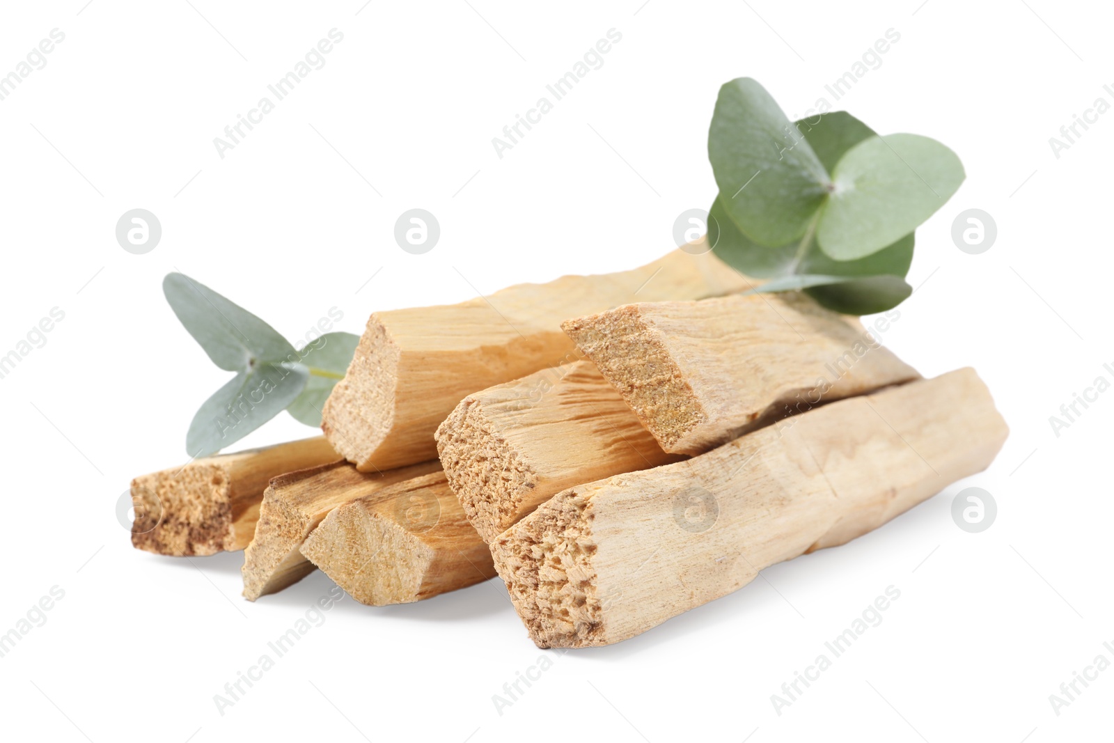 Photo of Palo santo sticks and eucalyptus branches isolated on white