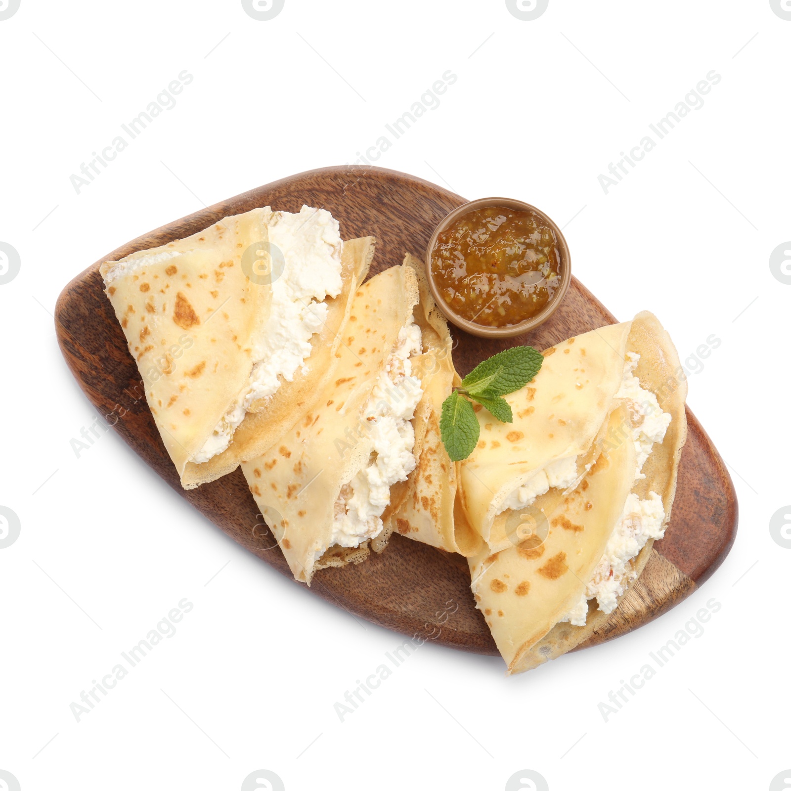 Photo of Delicious crepes with cottage cheese, jam and mint isolated on white, top view