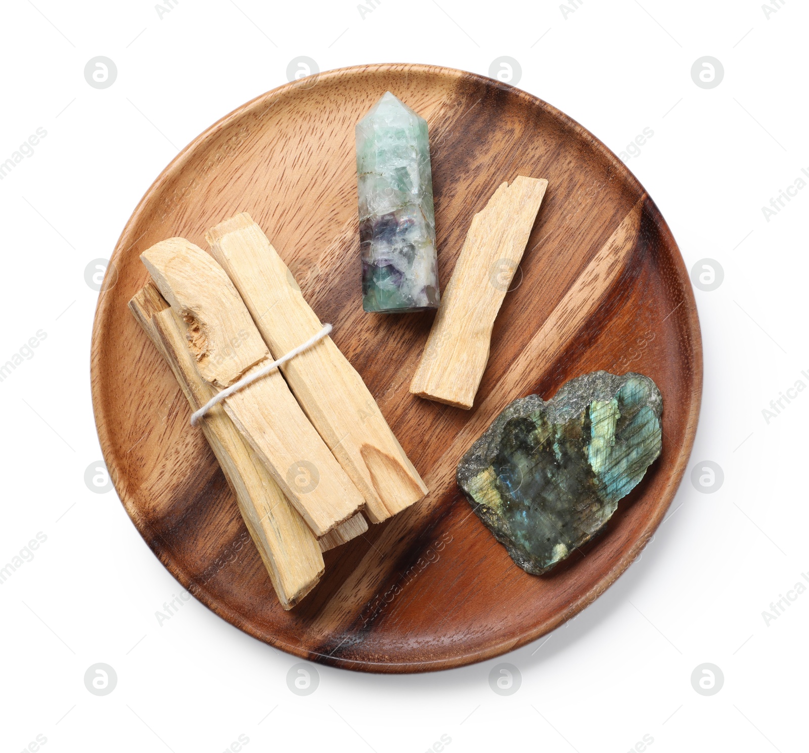 Photo of Palo santo sticks and gemstones isolated on white, top view