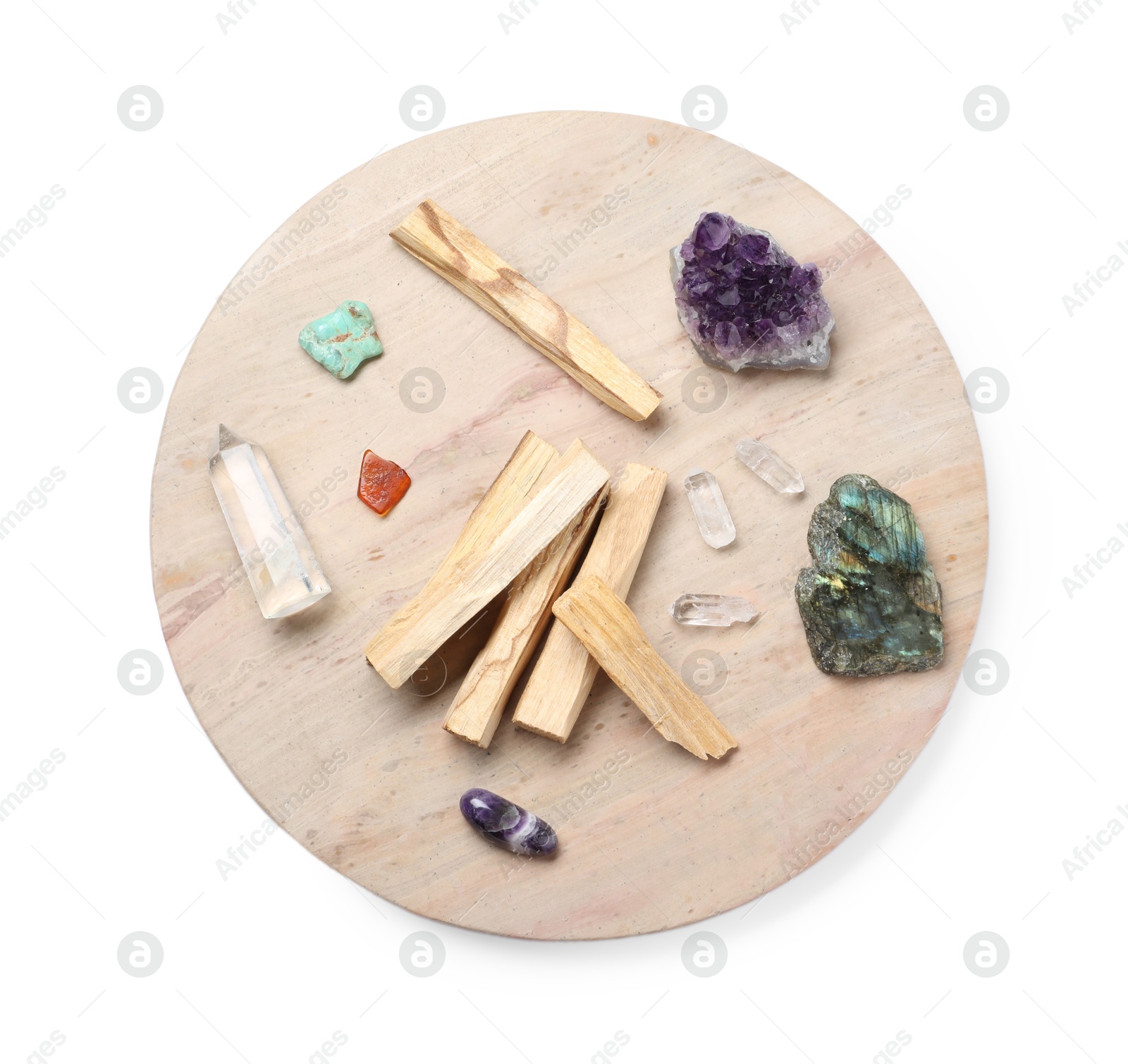 Photo of Palo santo sticks and gemstones isolated on white, top view