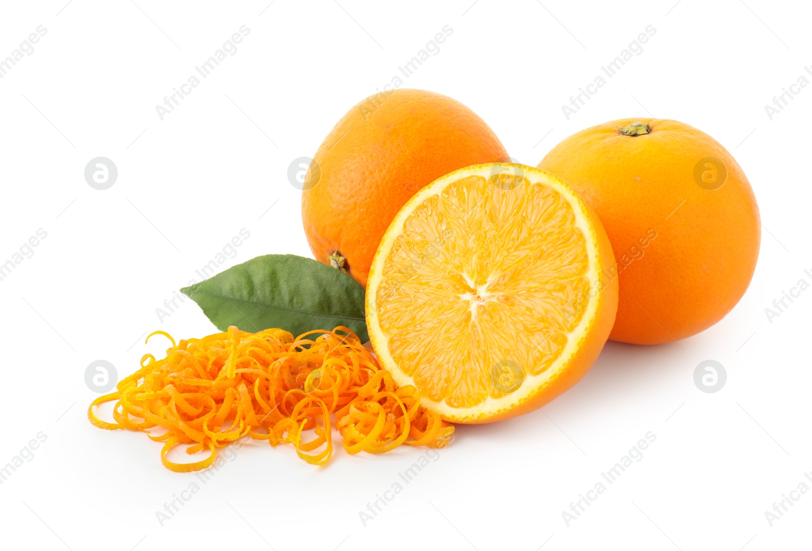 Photo of Pile of fresh orange zest, fruits and leaf isolated on white