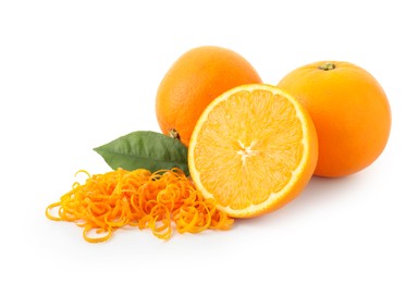 Photo of Pile of fresh orange zest, fruits and leaf isolated on white