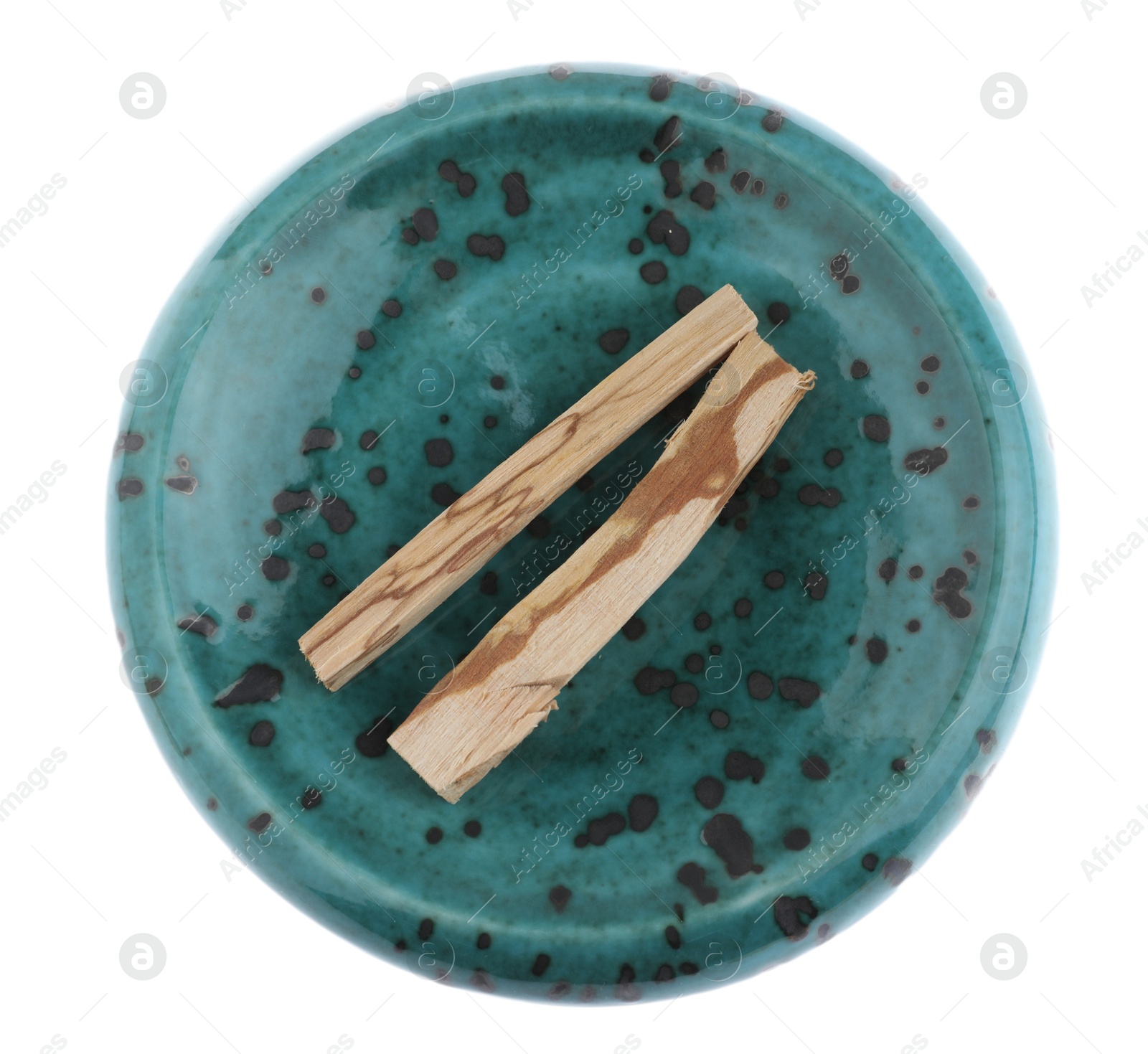 Photo of Palo santo sticks on white background, top view