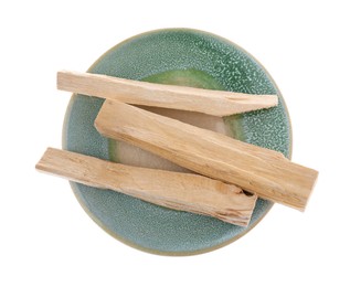 Photo of Palo santo sticks on white background, top view