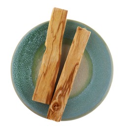 Photo of Palo santo sticks on white background, top view