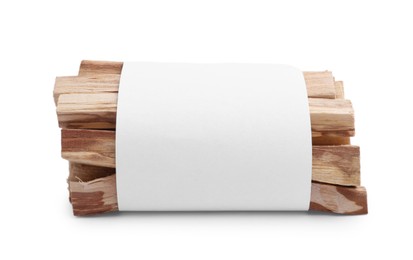 Palo santo sticks wrapped in paper on white background