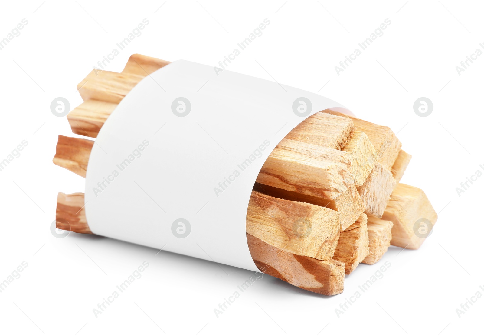 Photo of Palo santo sticks wrapped in paper on white background