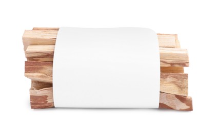 Photo of Palo santo sticks wrapped in paper on white background