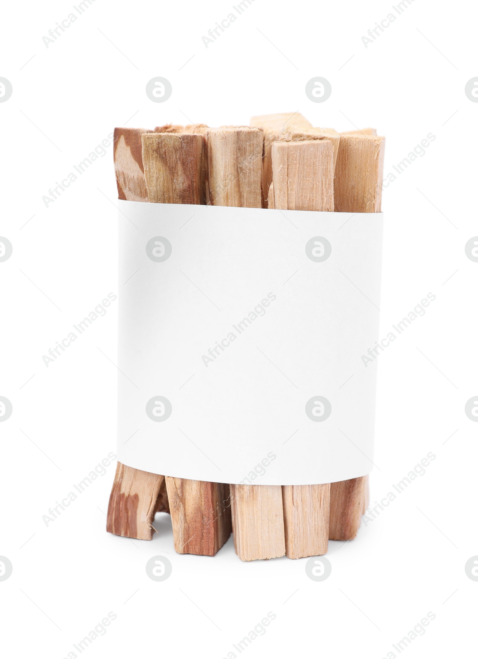 Photo of Palo santo sticks wrapped in paper on white background