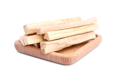 Pile of palo santo sticks on white background