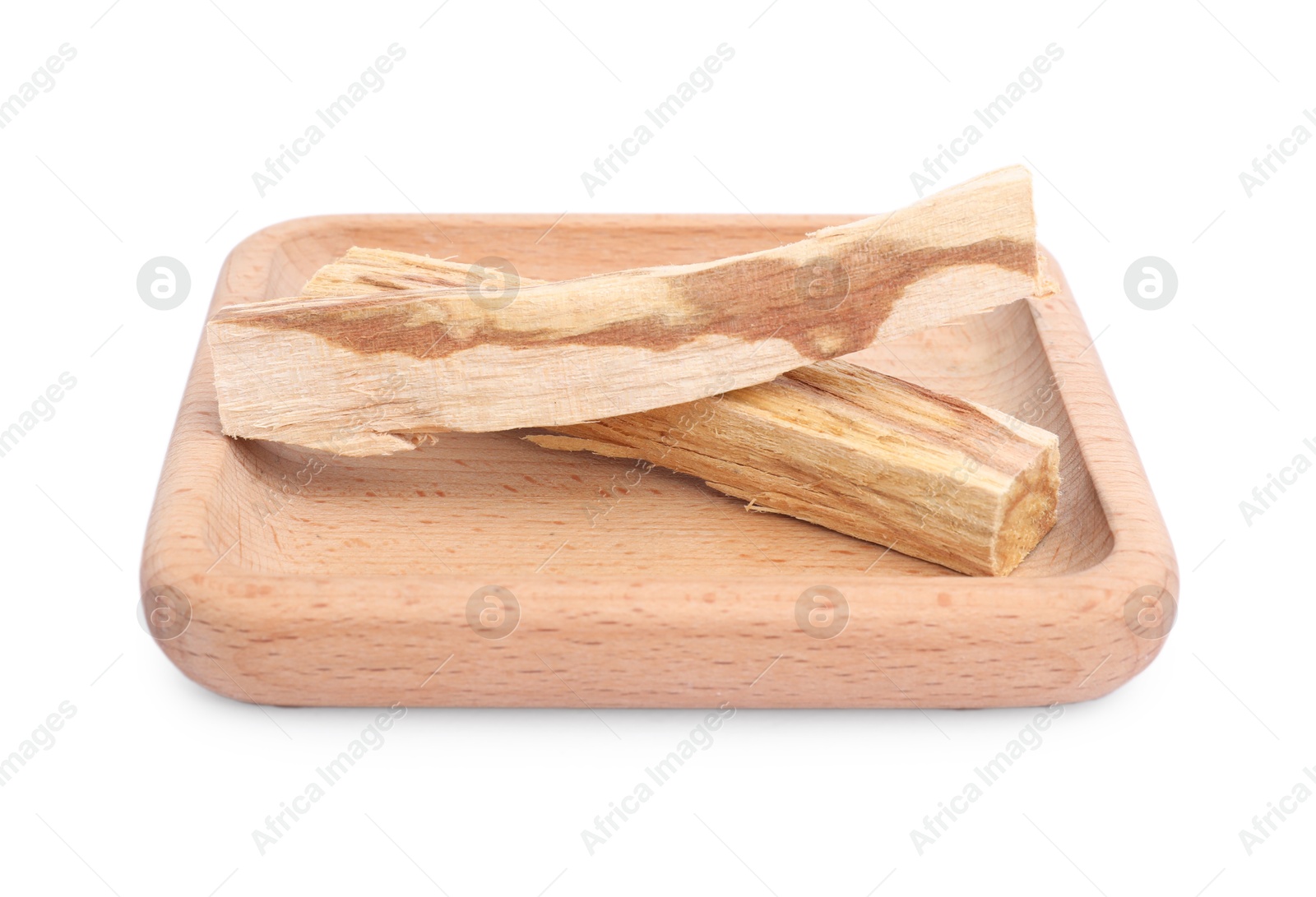 Photo of Two palo santo sticks on white background