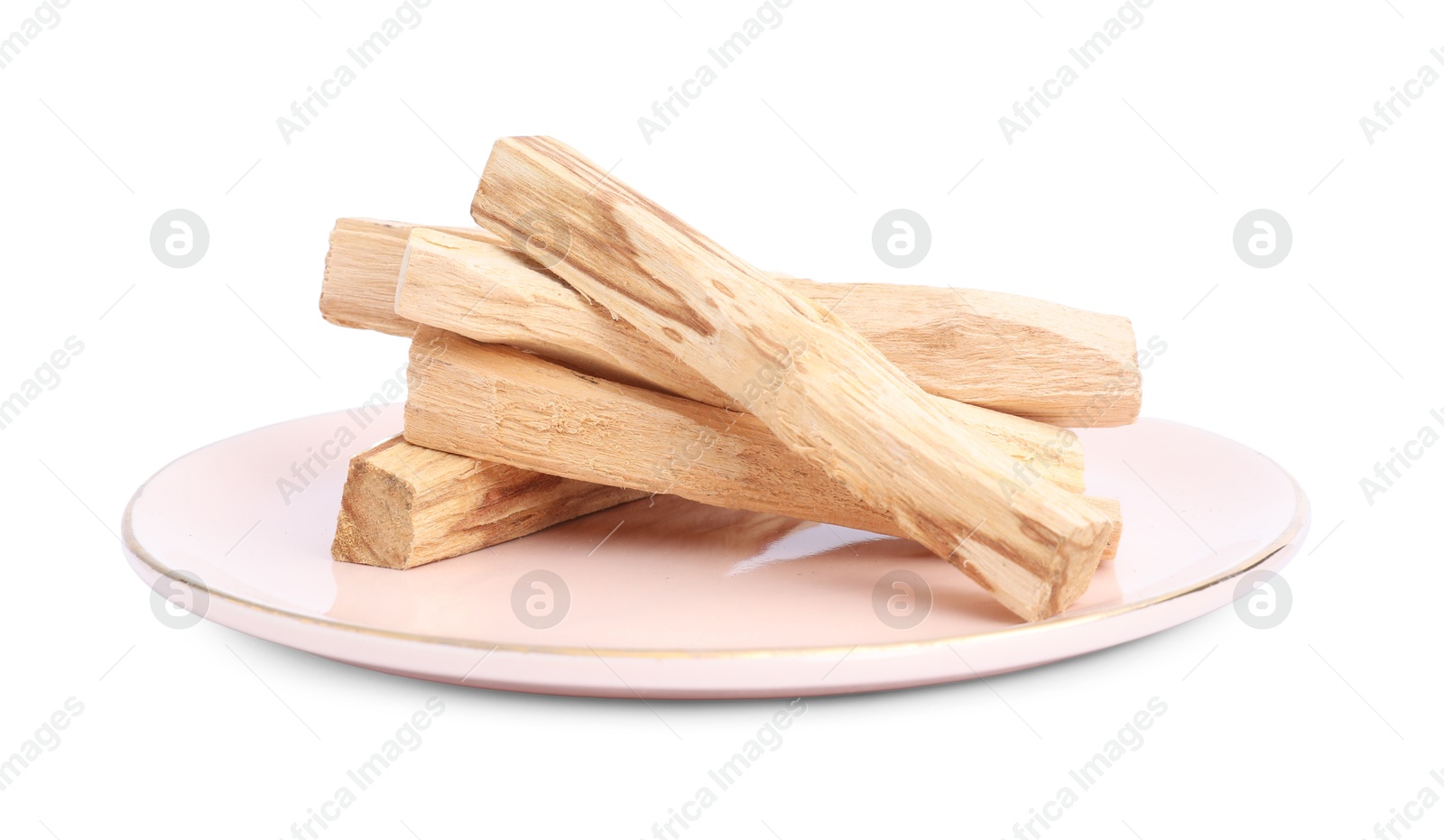 Photo of Pile of palo santo sticks on white background