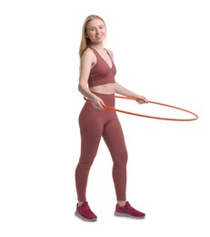 Photo of Beautiful young woman exercising with hula hoop on white background