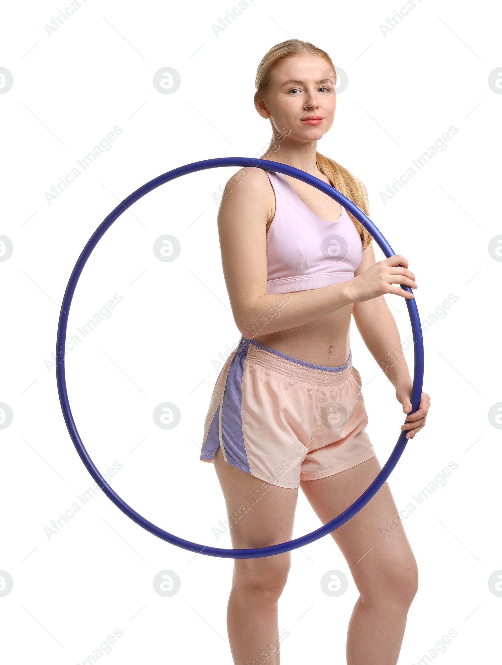 Photo of Beautiful young woman with hula hoop isolated on white