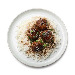 Photo of Delicious rice with meatballs, sauce and green onions isolated on white, top view