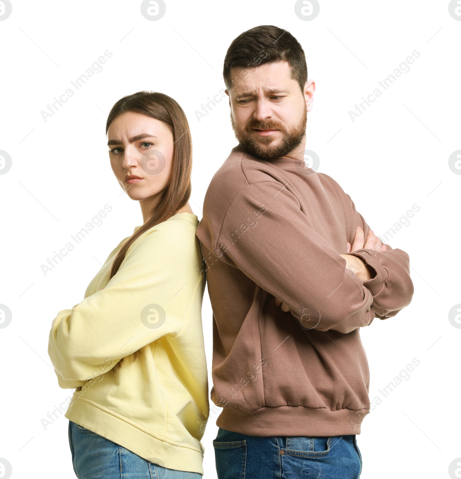 Photo of Resentful couple with crossed arms on white background