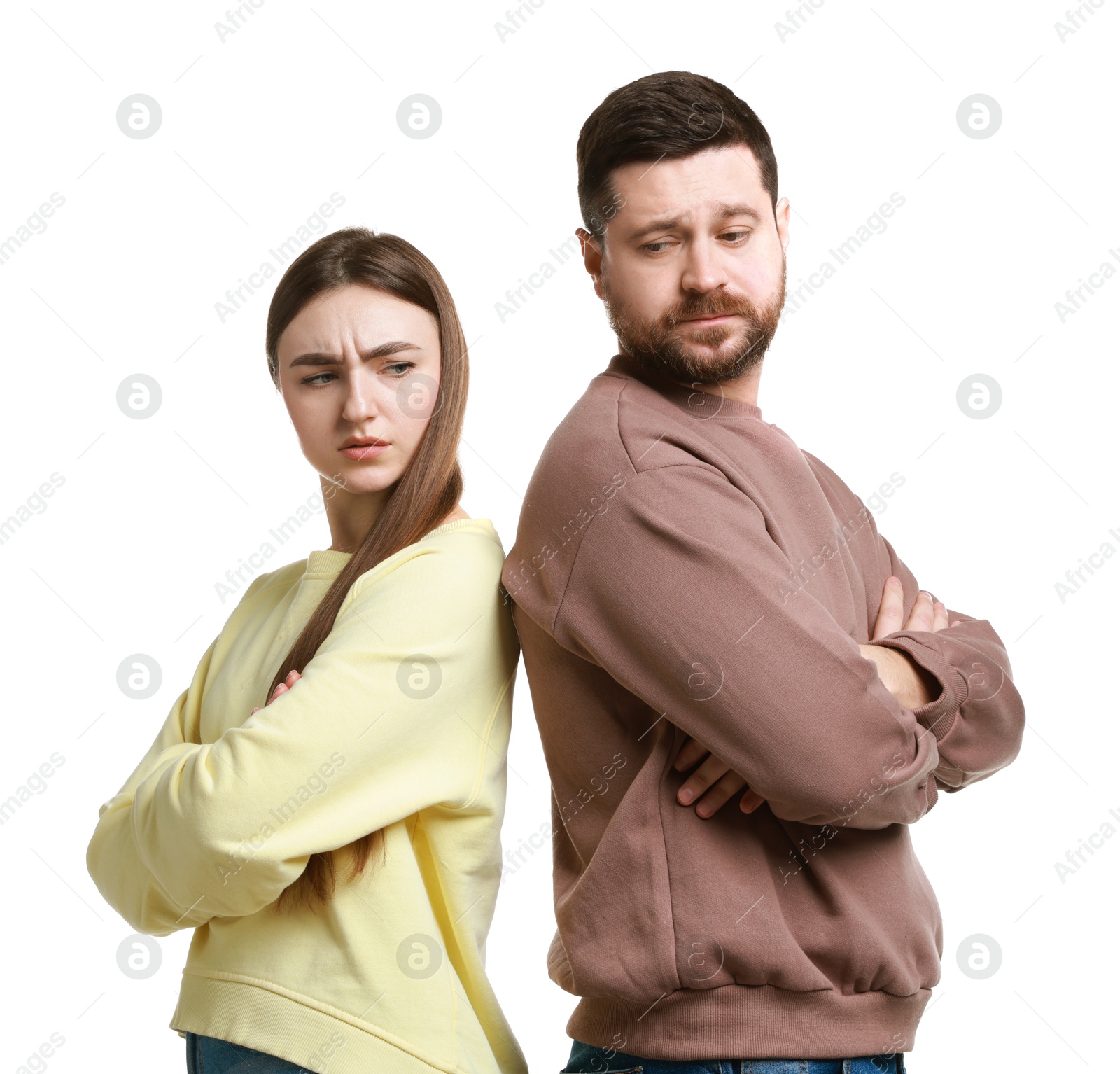 Photo of Resentful couple with crossed arms on white background