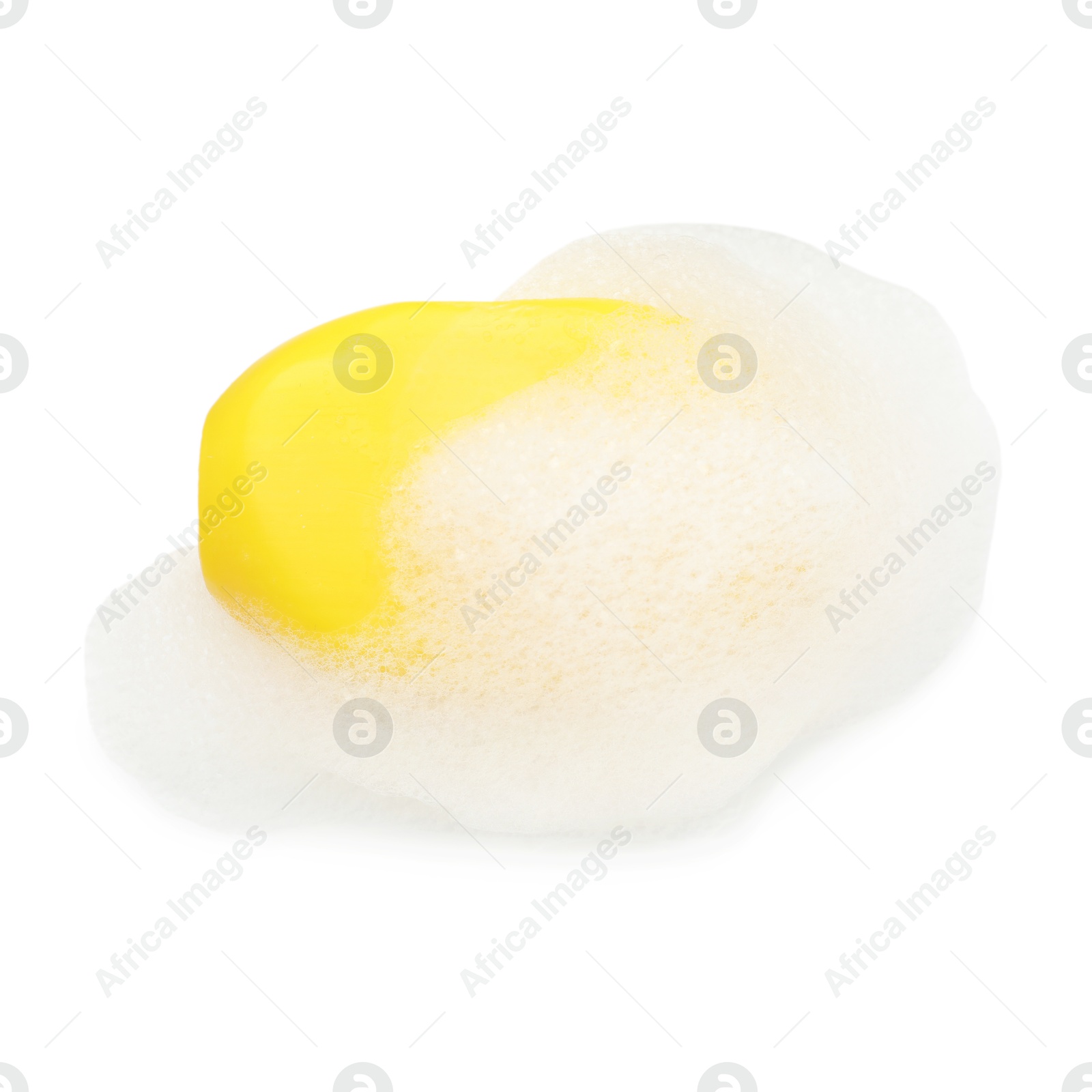 Photo of Yellow soap with foam on white background, top view