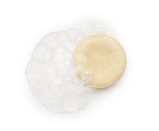 Photo of Soap with foam on white background, top view