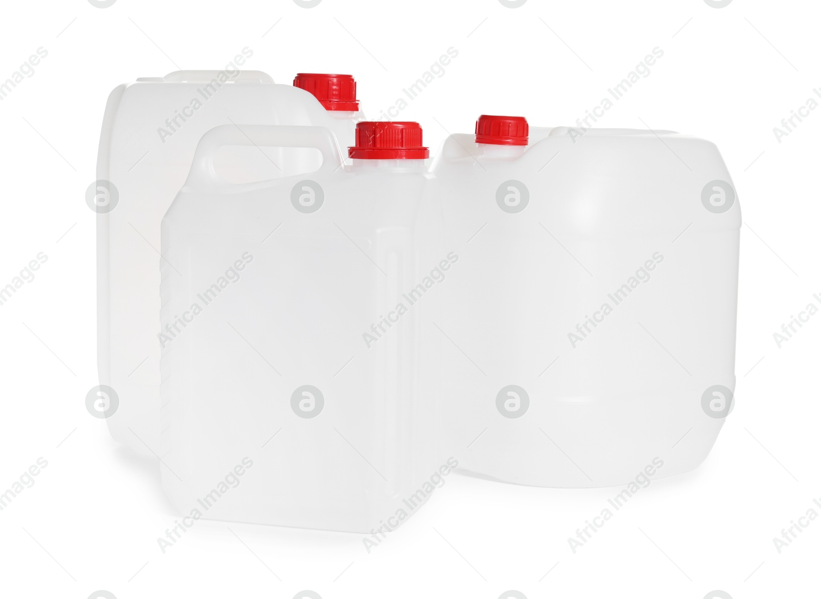 Photo of Three plastic canisters with caps isolated on white