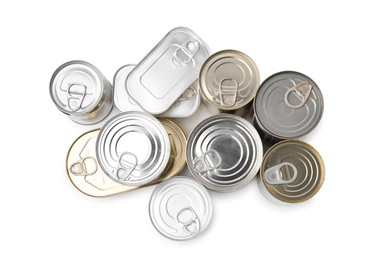 Photo of Many closed tin cans isolated on white, top view