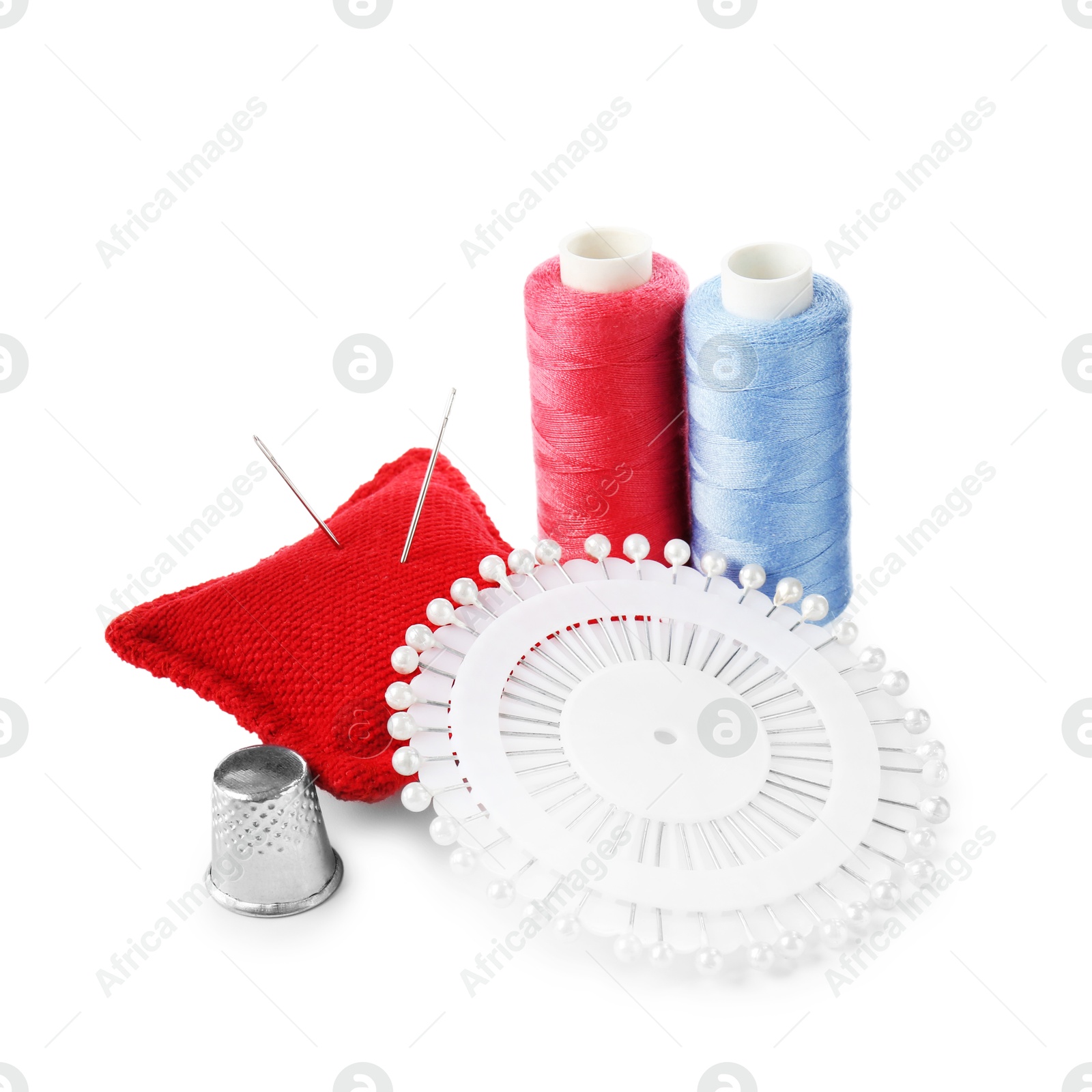 Photo of Threads and other sewing supplies isolated on white