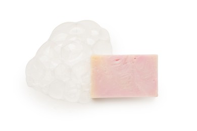 Photo of Soap with foam on white background, top view