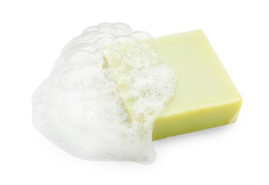 Photo of Light green soap with foam on white background