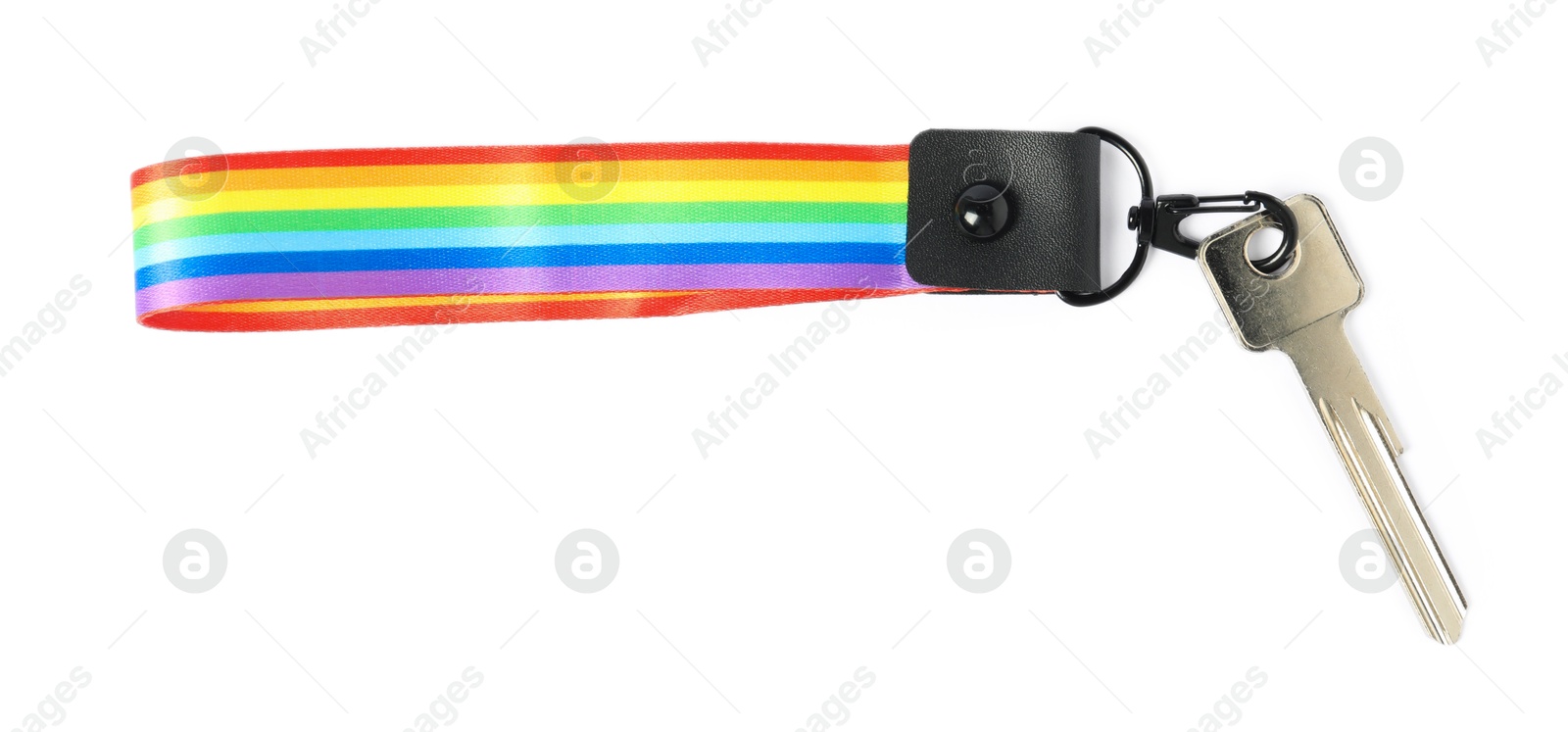 Photo of Key with keychain in LGBT colors on white background, top view