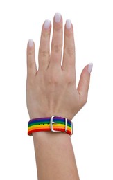 Photo of Woman wearing wristband in LGBT colors on white background, closeup