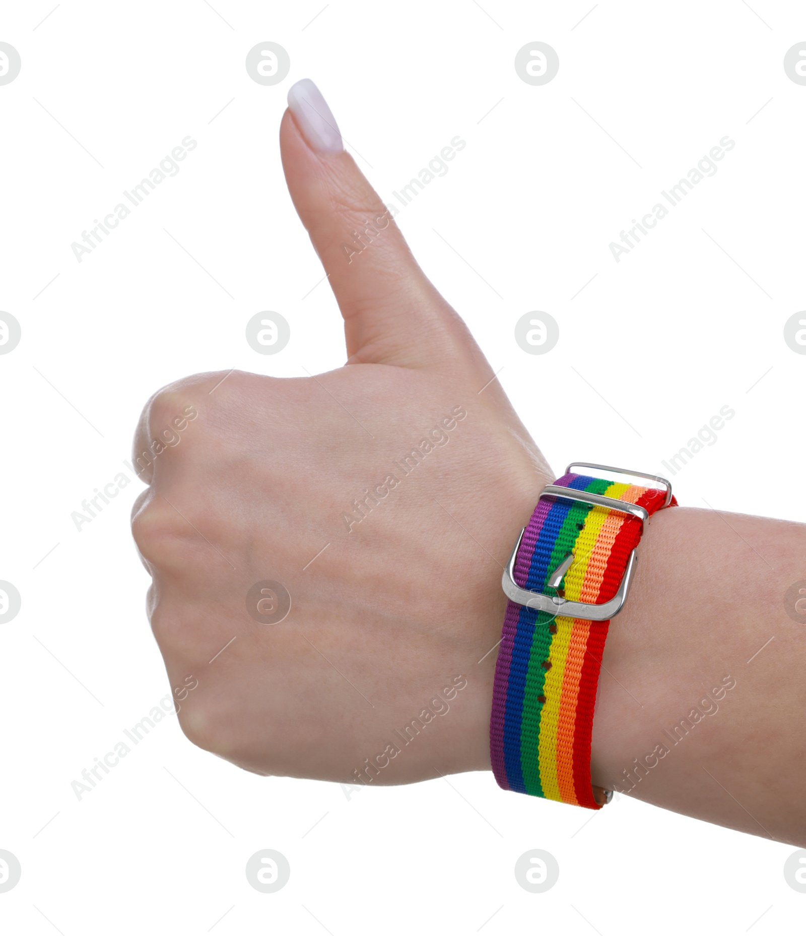 Photo of Woman wearing wristband in LGBT colors and showing thumbs up on white background, closeup