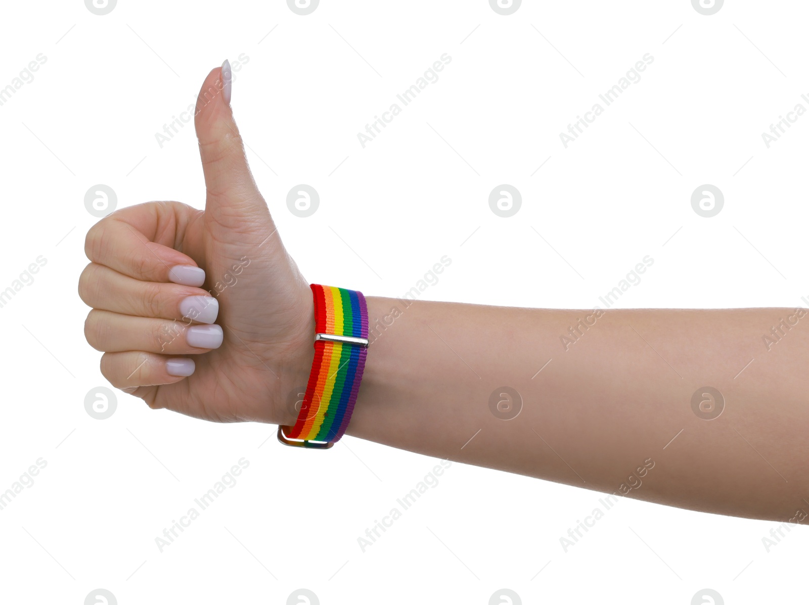 Photo of Woman wearing wristband in LGBT colors and showing thumbs up on white background, closeup