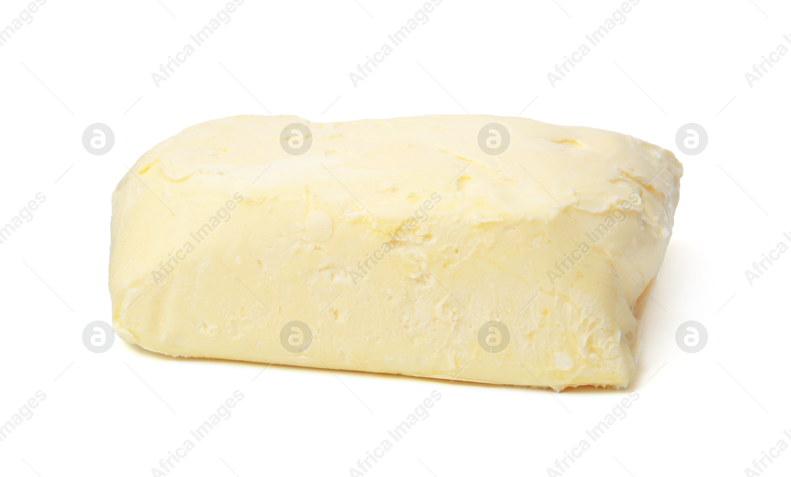 Photo of Block of tasty butter isolated on white