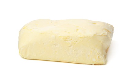 Photo of Block of tasty butter isolated on white