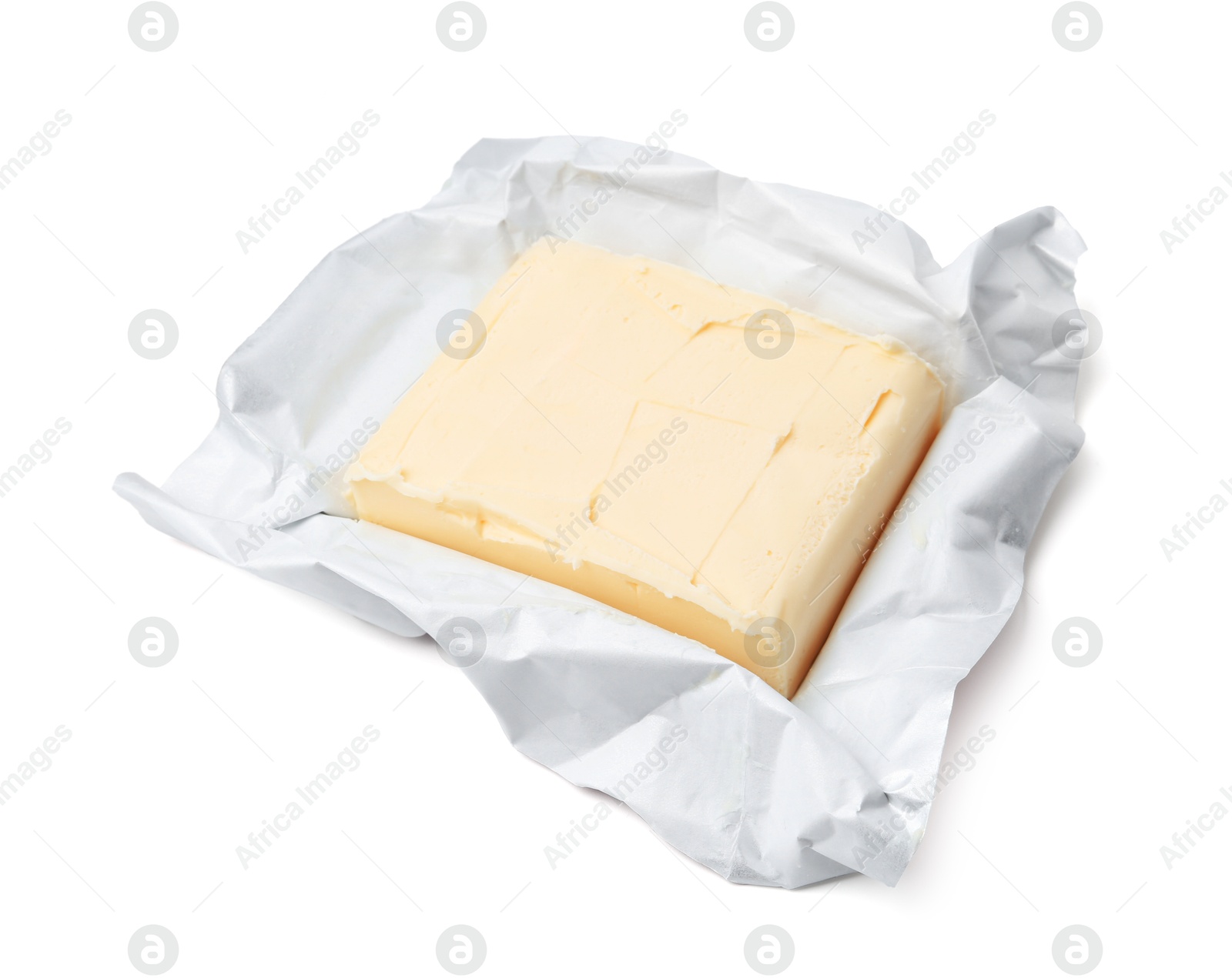 Photo of Block of tasty butter in open package isolated on white