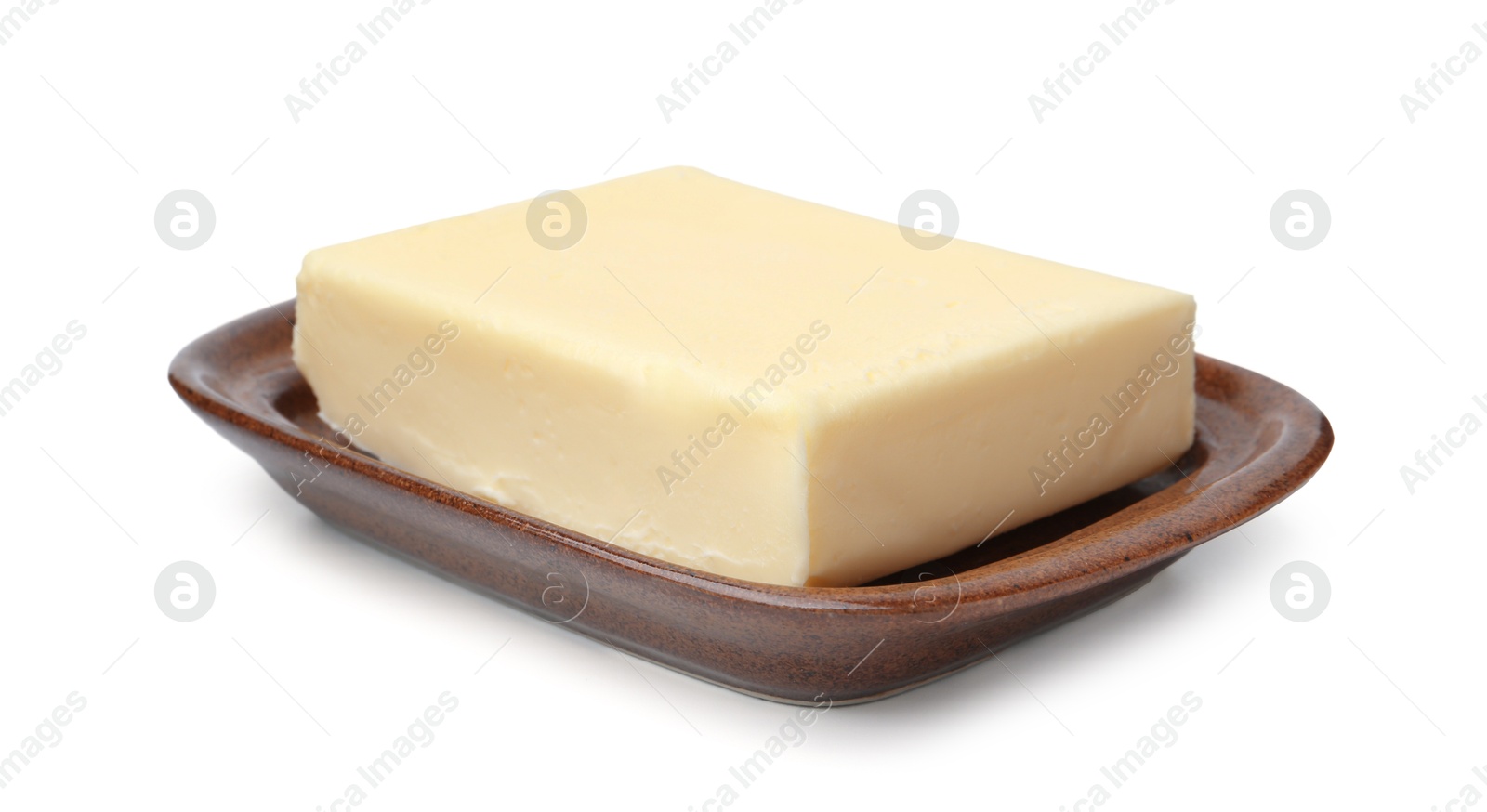 Photo of Block of tasty butter in dish isolated on white