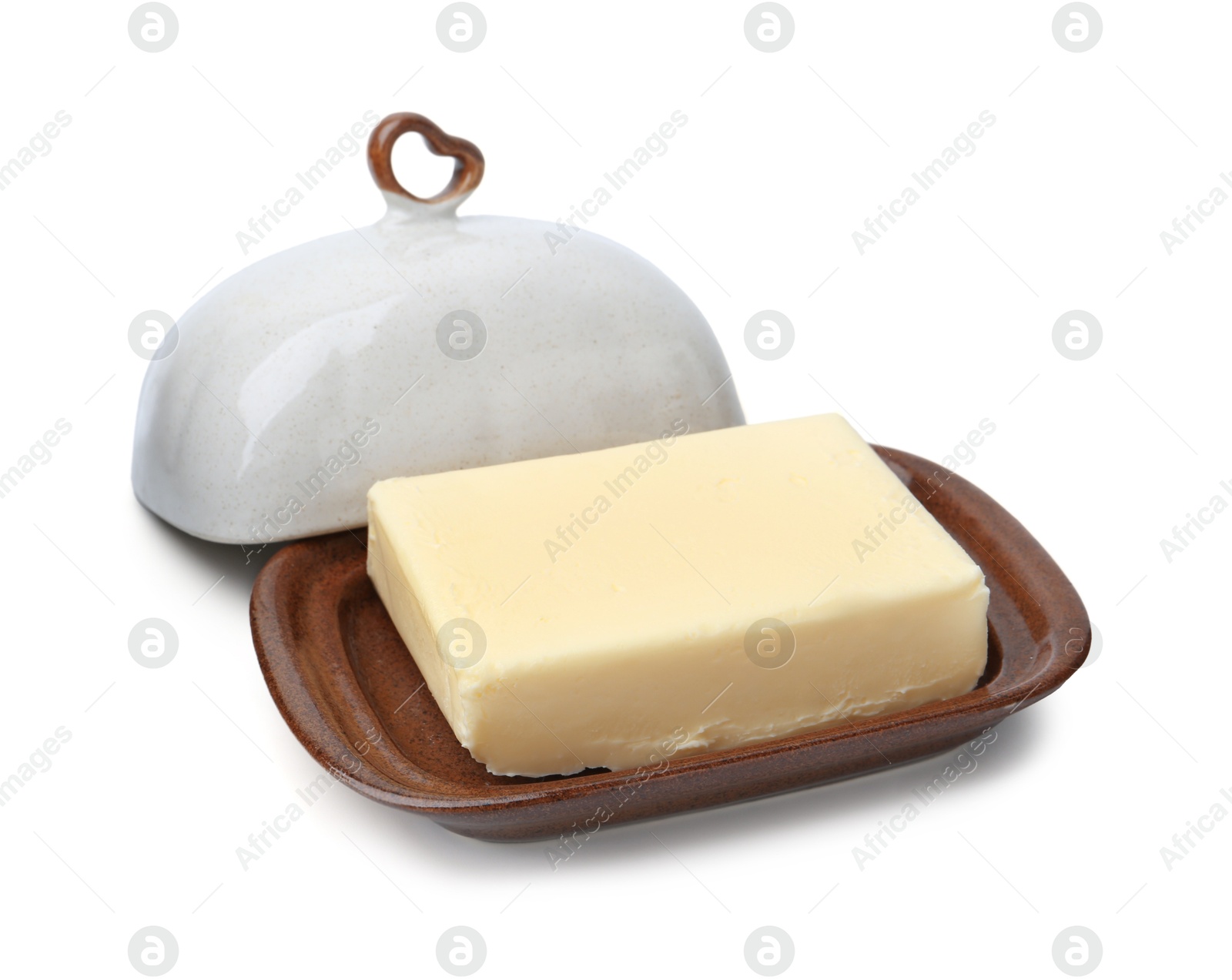 Photo of Block of tasty butter in dish isolated on white