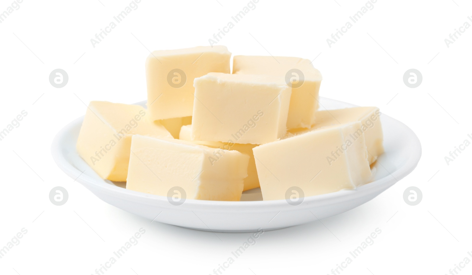 Photo of Pieces of fresh butter isolated on white