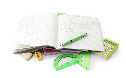 Photo of Doing homework. Notebook with math assignment and stationery on white background